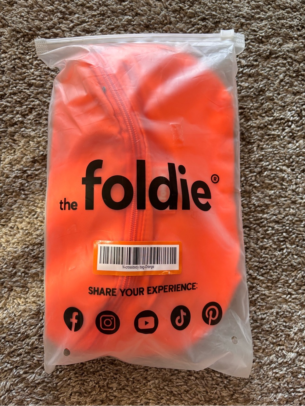NWT The Foldie Orange Crossbody Bag/Fanny Pack/Travel Bag RFID safe wallet
